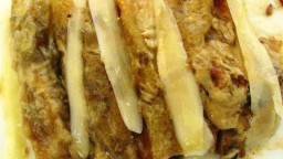 Recepta de cuina de Canelons  farcits amb botifarra negra i gambetes amb crema de carxofes