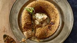 Recepta de cuina de Anell d'arròs amb cubs de pollastre, ceps i salsa d'estragó