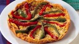 Recepta de cuina de Truita amb ceba tendra i pebrots