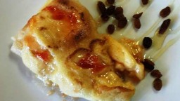 Recepta de cuina de Bacallà confitat amb melmelada de tomàquet, amb allioli i panses