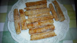 Recepta de cuina de Canyes ensucrades i farcides de crema