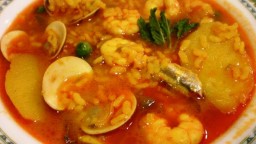 Recepta de cuina de Cassola de patates, arròs, cloïsses, gambes i seitons