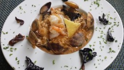Recepta de cuina de Risotto de bolets, gambes i cloïsses