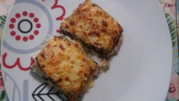 Recepta de cuina de Albergínies farcides de carn, gratinades amb beixamel