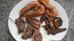 Recepta de cuina de Magret d'ànec amb gambes i xips de cep