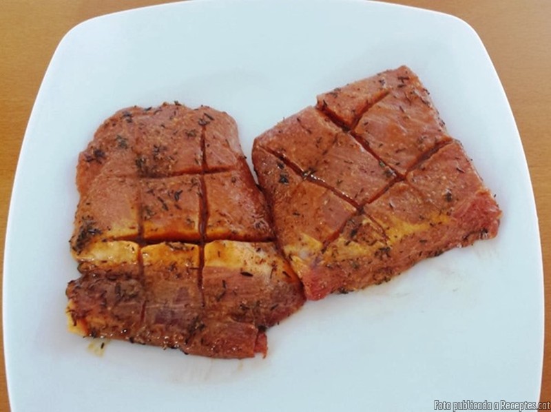Ploma de porc en adob a la planxa