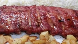 Recepta de cuina de Costellam de porc amb patates i arròs blanc