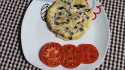 Recepta de cuina de Truita de patata i ceba amb botifarra negra de perol