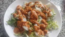 Recepta de cuina de Escarola amb bacallà i salsa romesco