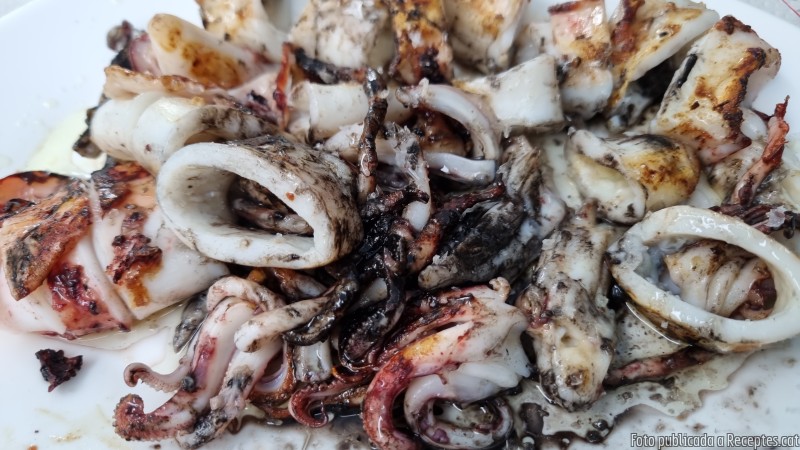 Calamars de potera amb la seva tinta