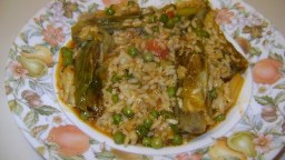 Recepta de cuina de Arròs de bacallà amb alls tendres i carxofa