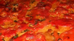 Recepta de cuina de Coca de pebrots vermells escalivats (Coca de prebes torrats)