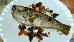 Recepta de cuina de Truites de riu amb pernil i pinyons