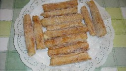 Recepta de cuina de Canonets farcits de crema i ensucrats
