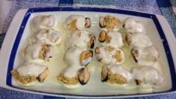 Recepta de cuina de Ous amb beixamel i musclos