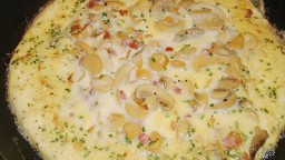 Recepta de cuina de Truita d'ous amb Cansalada i Xampinyons