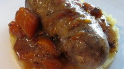 Recepta de cuina de Botifarra de perol amb crema de patates