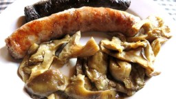 Recepta de cuina de Botifarra negra i botifarra crua a la brasa amb llenegues