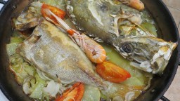 Recepta de cuina de Calet (besuc de la piga negra) amb gall de Sant Pere al forn