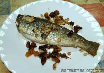 Recepta de cuina de Truites de riu amb pernil i pinyons