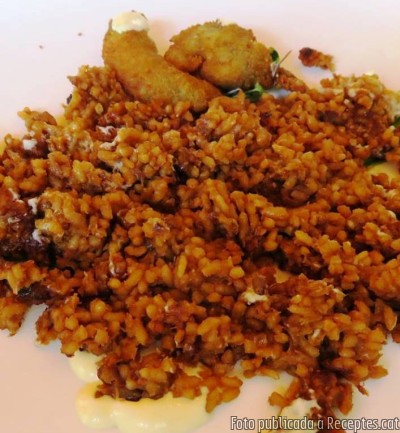 Recepta de cuina de Arròs socarrat de gambes amb alioli
