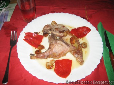 Recepta de cuina de Chuleta de cerdo al ajillo con pimientos del piquillo