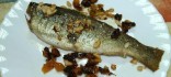 Truites de riu amb pernil i pinyons