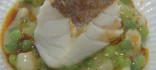 Bacallà confitat  amb favetes i pernil