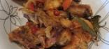 Conill guisat amb sofregit de ceba, tomàquet i all
