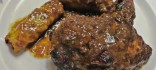 Perdiu de caça estofada amb farcellets de col farcits de carn picada