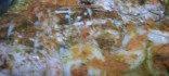 Pit de pollastre al forn amb patates, ceba i tomàquet